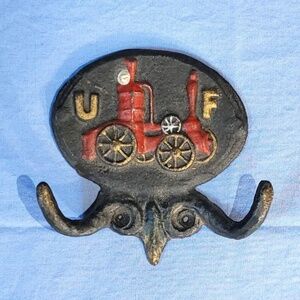 Vintage Cast Iron United Firefighter Insurance Wall Hook
